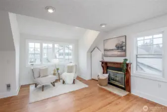 Picture yourself enjoying your morning coffee and a good book in this corner of the primary bedroom