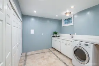 This large laundry has plenty of storage space