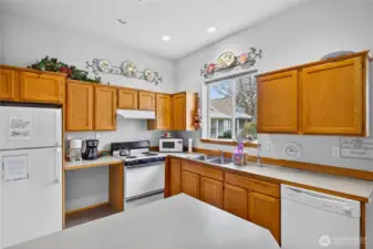 The spacious kitchen is ideal for these large gatherings.