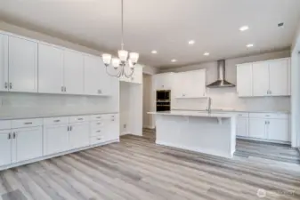 Photo not from actual home. Kitchen will feature matte black finishes