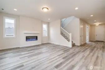 Photo not of actual home. Great room