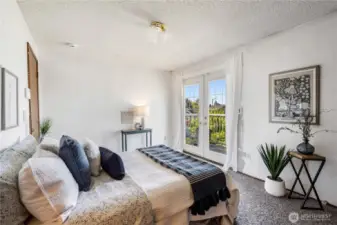 The double doors provide generous light and a nice view from the home's perch above the street.