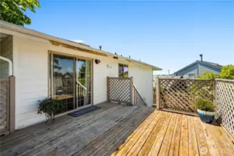 The deck is an extension of the living space, located just off the dining room. Bring your handyman skills to make it your dream outdoor space!