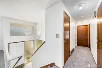 On the main level are three bedrooms, including the primary suite.