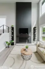 Gas fireplace and wired inset for TV or art make this living room ready for entertaining.