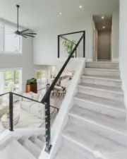 Open and sleek stairs to second floor