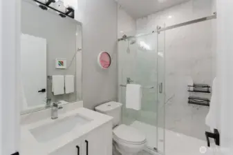 First floor bathroom with tiled shower