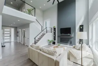 19' vaulted ceilings to second floor loft create and open and grand feel