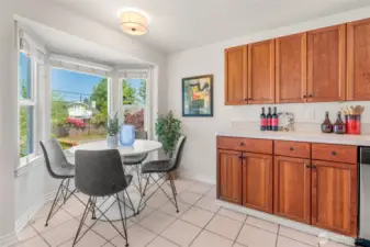 Eat-in area of kitchen with bay windows