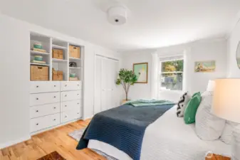 spacious upstairs bedroom 1 with built-ins
