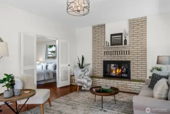 Curl up by the statement brick fireplace in the living room, the perfect spot for cool Northwest evenings.