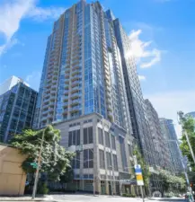 The tower stands 34 stories tall, offering panoramic views of the city skyline, Puget Sound, and the Cascade and Olympic Mountains.