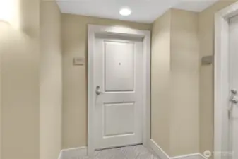 entry door to Unit 1101 at The Cosmopolitan in Seattle.
