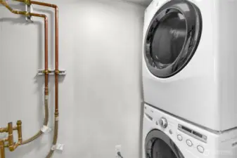 In Unit Laundry.  A modern, front-loading stacked washer and dryer provide maximum efficiency while saving space.