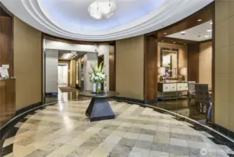 Residents enjoy full-service luxury amenities, including a 24-hour concierge, fitness center, spa/sauna, business center, guest suites, and a resident lounge