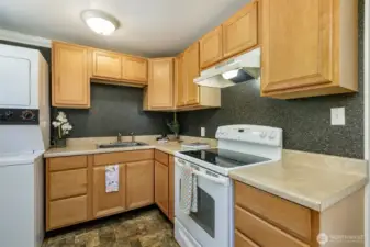 Updated kitchen cabinetry; stack washer/dryer is included