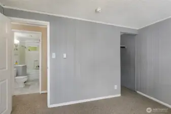 2nd view of front bedroom to updated bath
