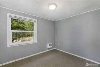 Rear bedroom enjoys backyard views