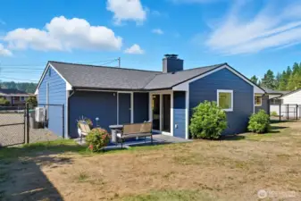 Backyard is fully fenced, providing privacy and security.