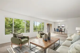 Open floor plan living/dining *virtually staged*