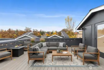 Sunny roof top deck (Virtually staged) with territorial views and glimpses of downtown