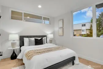 Third bedroom at ground level is perfect for a home office .