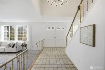 Elegant double doors introduce this classic Colonial style home, featuring timeless character and a warm, inviting feel.