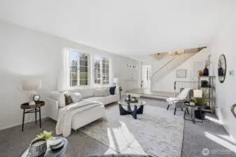 Newly installed carpet that runs throughout the home, adding comfort and a fresh move-in-ready feel.