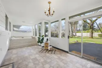 Featuring a blank canvas, this sunroom is ready to be transformed into whatever suits your lifestyle.