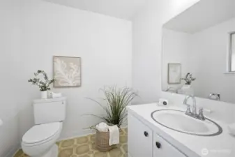 This half bathroom is conveniently located on the main floor for easy access for the guests.