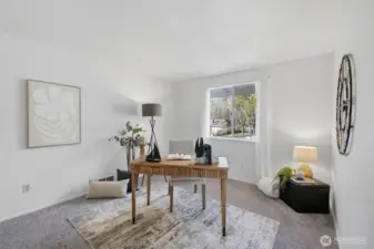 Second bedroom with a view of the balcony.