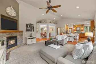 Vaulted ceiling over living and dining rooms. Hardwood floors with inlay.