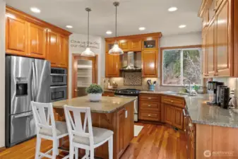 Walk in pantry, kitchen appliances stay with home. Power and storage in the island.