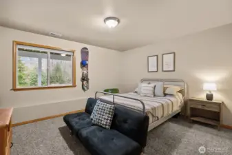 One of two large lower level bedrooms.