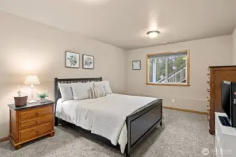 Two of two large lower level bedrooms off the recreation room.