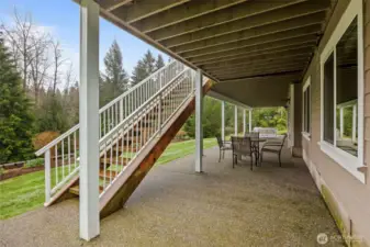 Expansive patio to extend your gatherings outdoors off the recreation room.