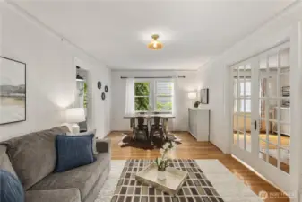 French doors can be open or separate living areas and bedroom.