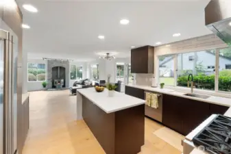 Kitchen has a large window overlooking the enormous backyard and entertainment sized deck.