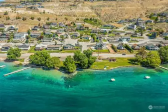 Chelan Hills Willows Park: picnic areas, sandy walk out swim area, play areas, day use dock, buoys, paddleboard    & kayak storage, restroom
