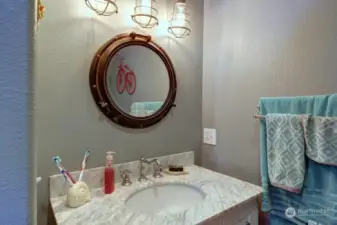 Guest bath white marble countertop and shower