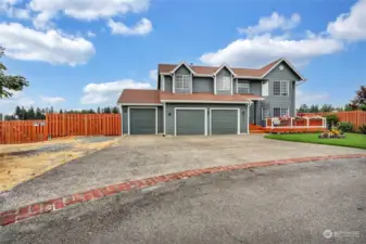 Clean lines, fresh exterior paint, new roof, furnace, hot water tank, flooring and two covered decks and three car garage, all on a supersized large lot.