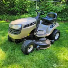 Craftsman Riding Mower stay with home.