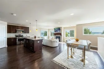 Take in all the picture windows with lake and mountain views! Open concept living/kitchen/dining. Must see!