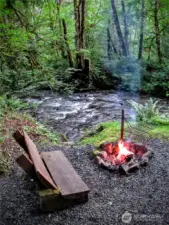 Enjoy a campfire by the soothing Little Quil River...365' of frontage with medium bank that has never flooded!