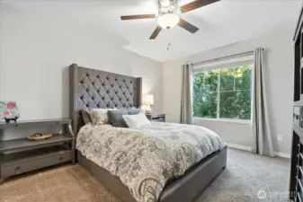 Primary Bedroom, w/ ceiling fan, balcony, walk-in closet & ensuite primary bath