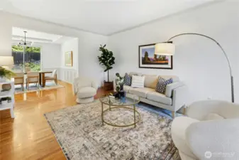The living room is spacious and has a nice front window that overlooks the front grounds.
