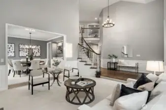 Open-concept floor plan - timeless elegance, featuring rich, freshly refinished hardwood floors.