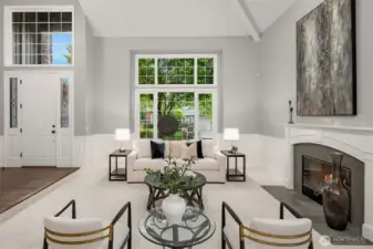 The living room highlights the vaulted ceiling, signature Murray Franklyn craftsmanship - from wainscoting to leaded-glass windows flanking the 8-foot front door - along with a cozy gas fireplace. NEW carpet was installed in August 2025. This home is move in ready!