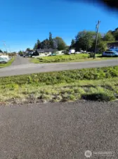 From the walking trail, view of the corner lot.