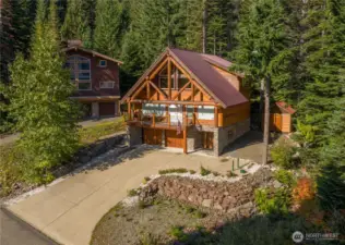 Step into a beautiful custom built European style chalet, with heated driveway